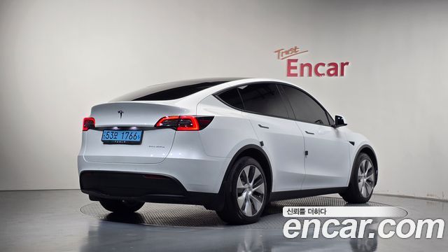 Tesla Model Y 2022 — photo 2