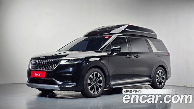 Kia Canival 2023 — photo 1