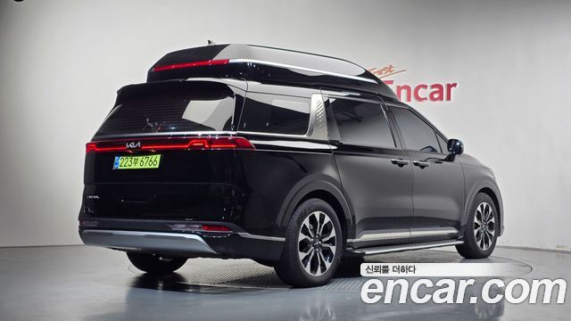 Kia Canival 2023 — photo 2