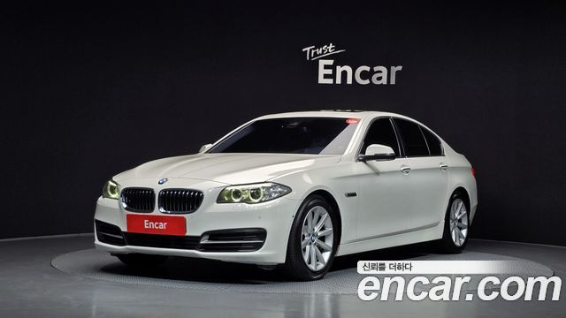 BMW 5-Series 2015 — photo 1