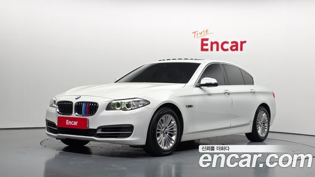 BMW 5-Series 2014 — photo 1