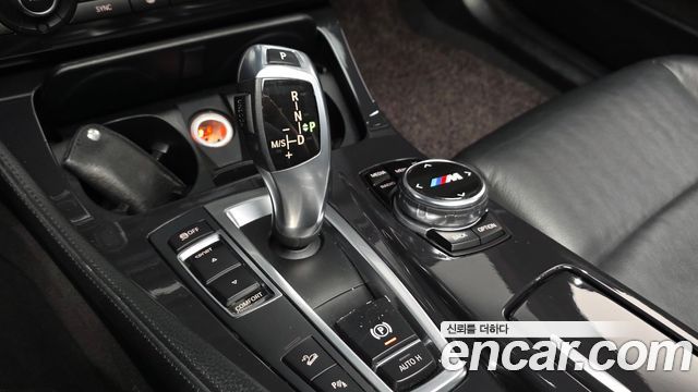 BMW 5-Series 2014 — photo 9