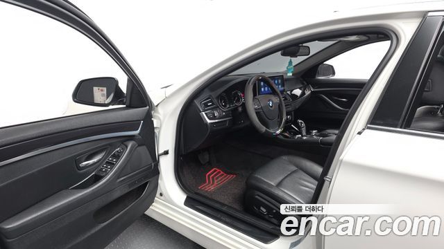 BMW 5-Series 2014 — photo 10