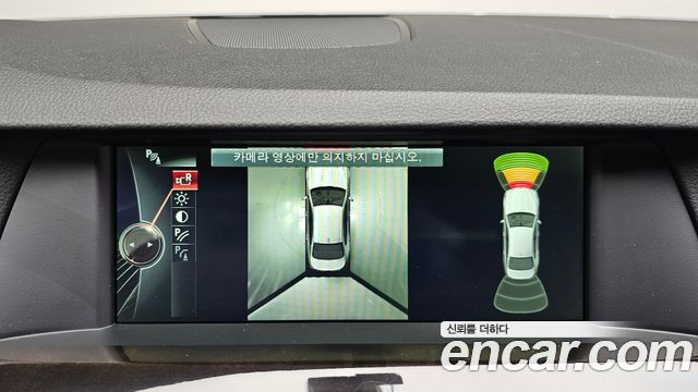 BMW 5-Series 2013 — photo 21