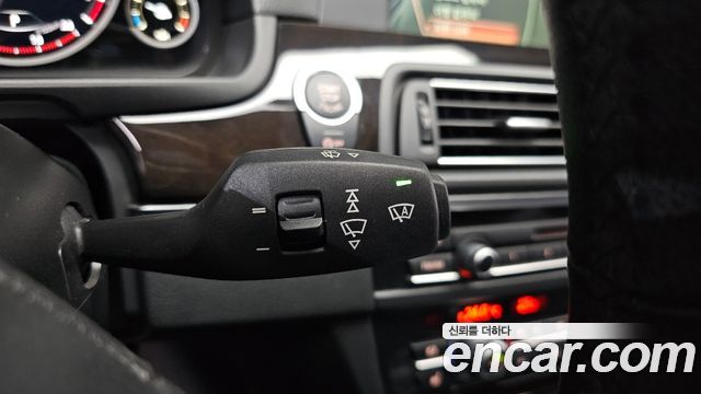 BMW 5-Series 2013 — photo 31