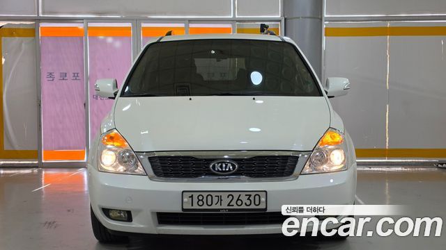 Kia Canival 2013 — photo 2