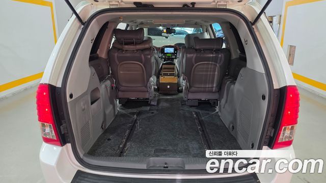 Kia Canival 2013 — photo 19