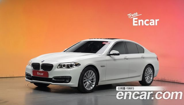 BMW 5-Series 2015 — photo 1