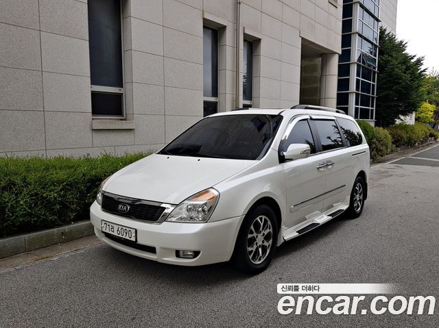 Kia Canival 2013 — photo 2