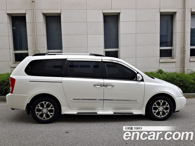 Kia Canival 2013 — photo 4