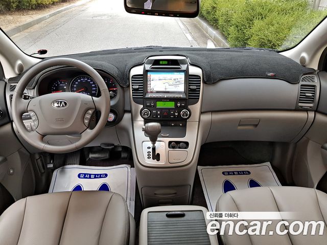 Kia Canival 2013 — photo 7