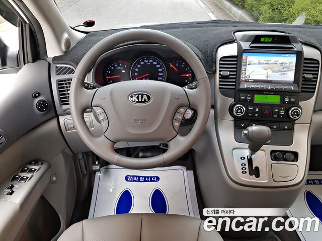 Kia Canival 2013 — photo 8