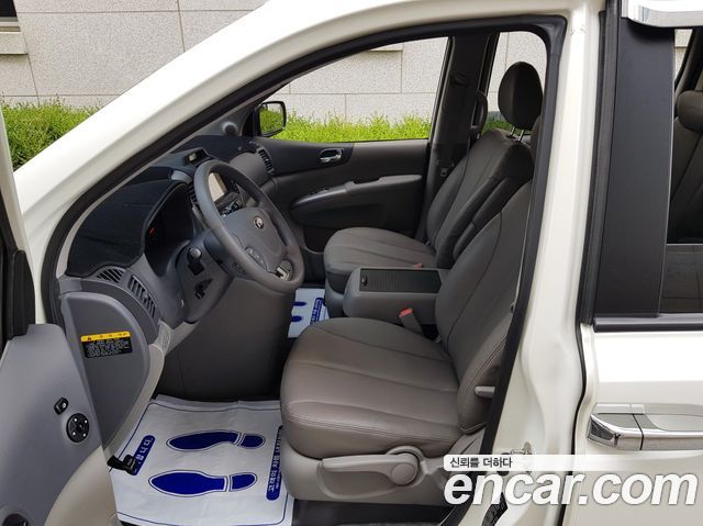 Kia Canival 2013 — photo 9