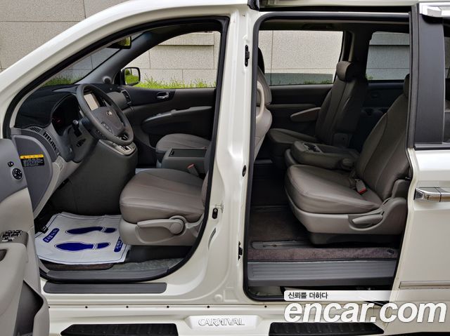 Kia Canival 2013 — photo 10