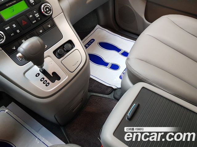 Kia Canival 2013 — photo 12