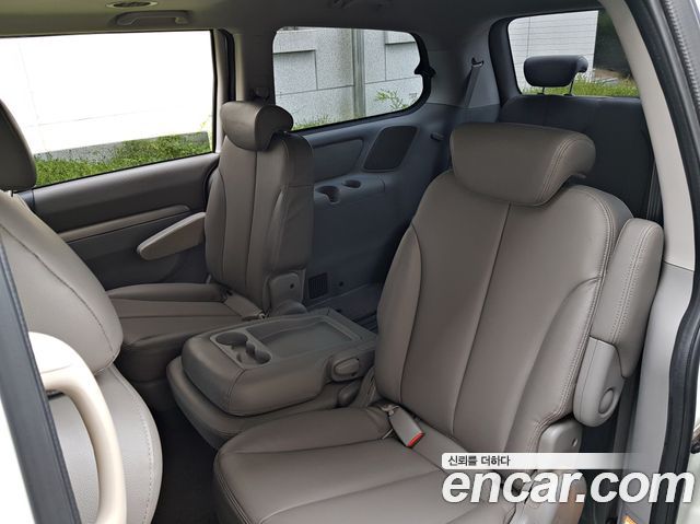 Kia Canival 2013 — photo 13