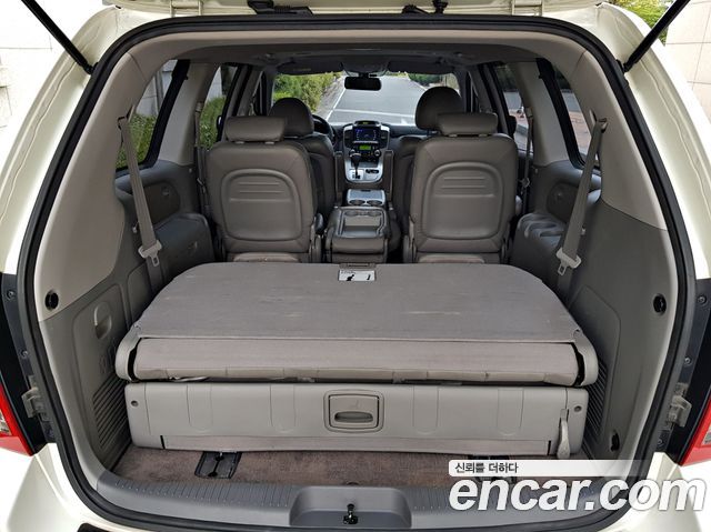 Kia Canival 2013 — photo 16