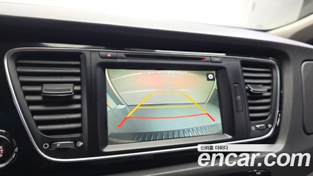 Kia Canival 2015 — photo 17
