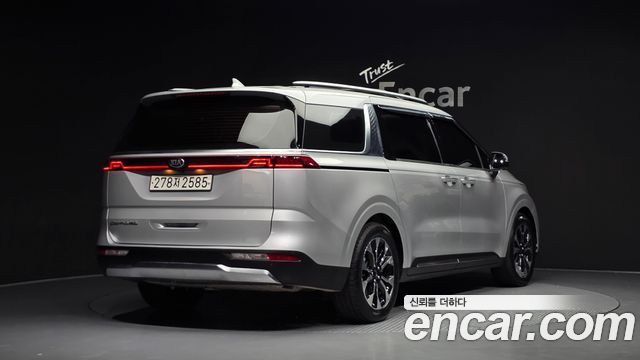 Kia Canival 2021 — photo 2
