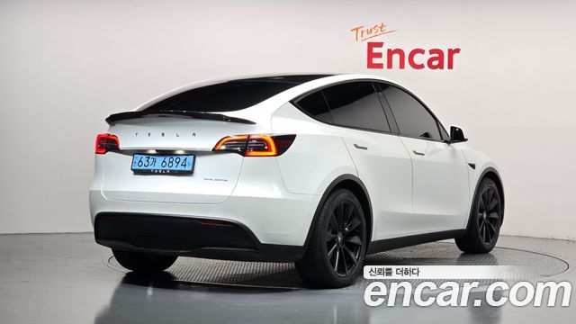Tesla Model Y 2021 — photo 2