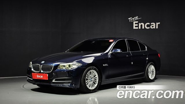 BMW 5-Series 2014 — photo 1