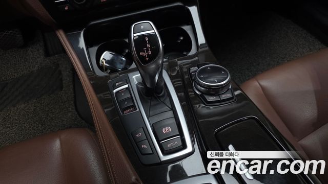 BMW 5-Series 2014 — photo 12
