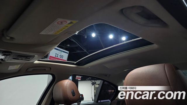 BMW 5-Series 2014 — photo 23