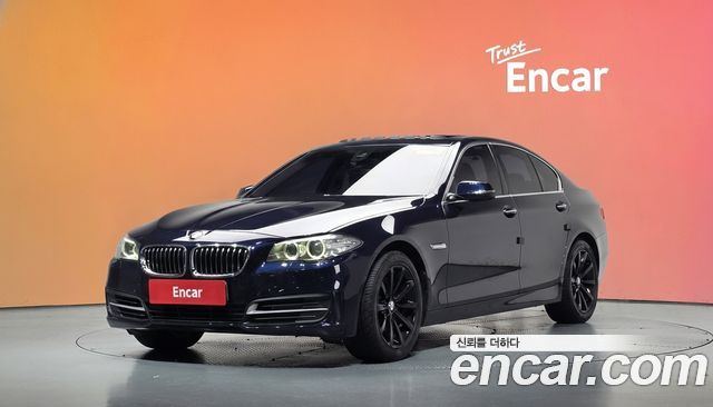 BMW 5-Series 2014 — photo 1