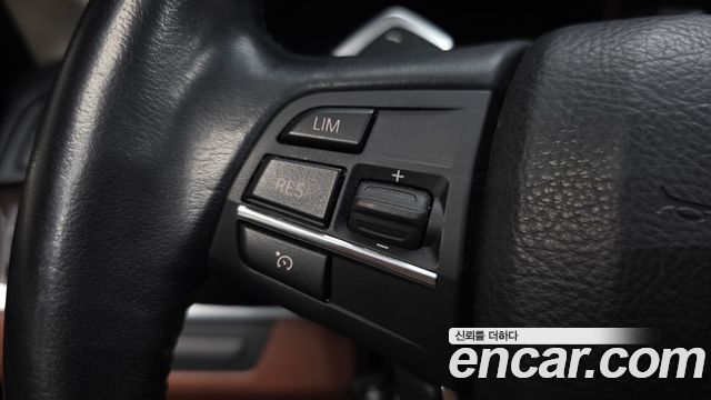 BMW 5-Series 2014 — photo 30