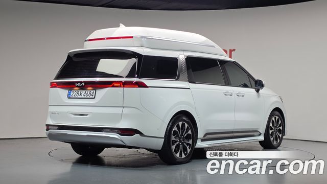 Kia Canival 2023 — photo 2