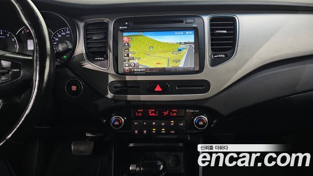 Kia Carens 2014 — photo 24