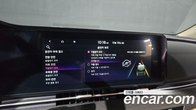 Kia Canival 2023 — photo 24