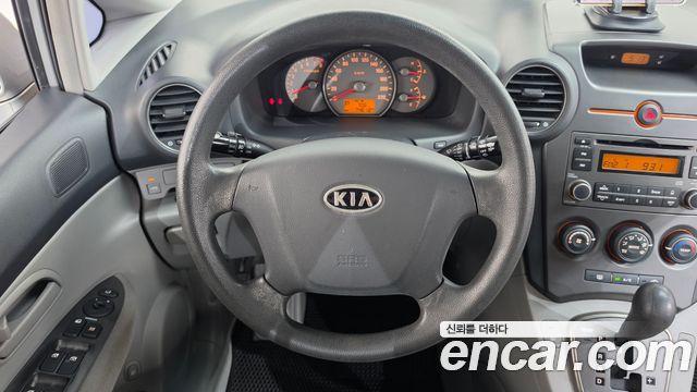 Kia Carens 2007 — photo 13
