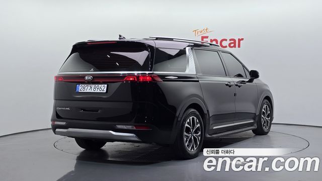 Kia Canival 2021 — photo 2