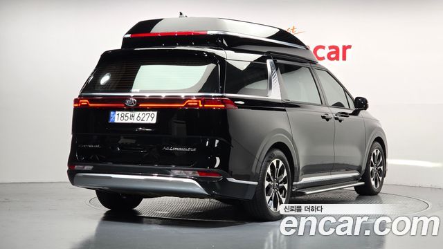 Kia Canival 2021 — photo 2