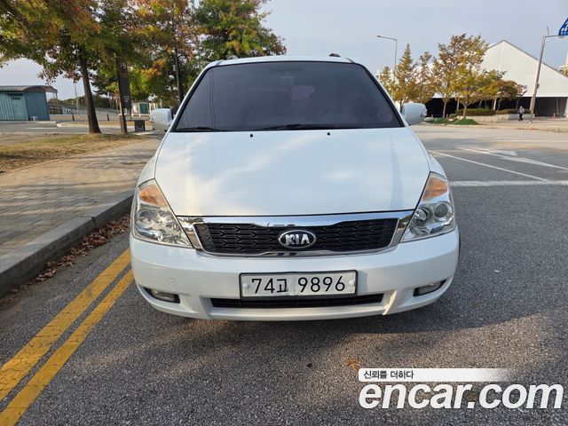 Kia Canival 2013 — photo 2