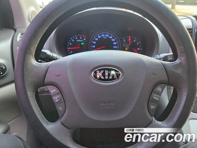 Kia Canival 2013 — photo 8