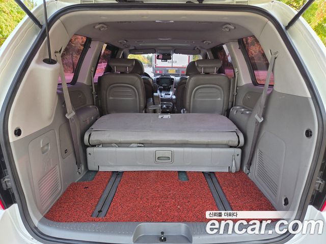 Kia Canival 2013 — photo 13