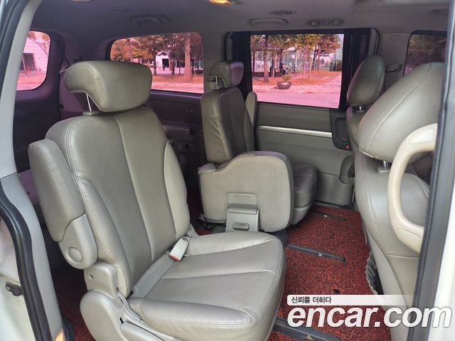 Kia Canival 2013 — photo 14