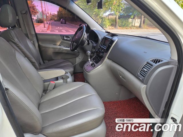 Kia Canival 2013 — photo 15