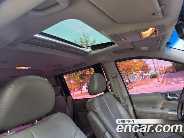 Kia Canival 2013 — photo 16
