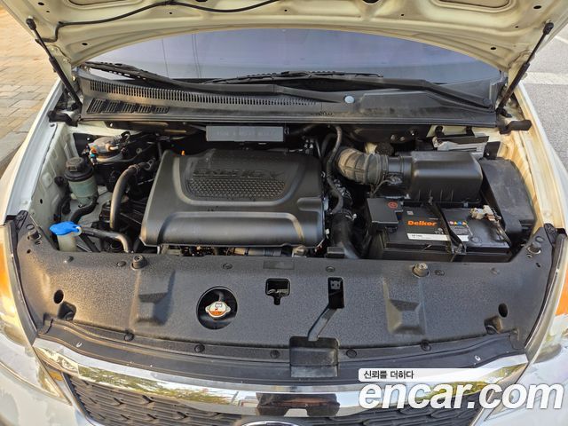 Kia Canival 2013 — photo 17