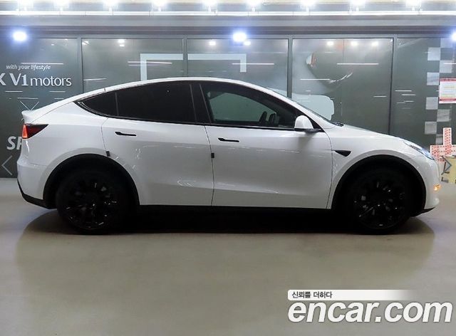 Tesla Model Y 2021 — photo 2