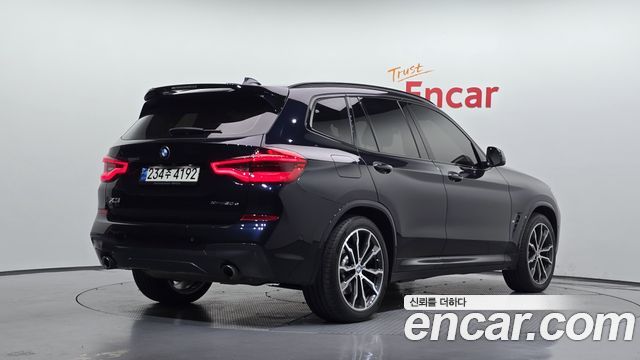 BMW X3 2021 — photo 2