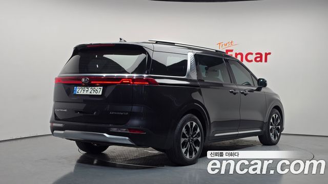 Kia Canival 2021 — photo 2