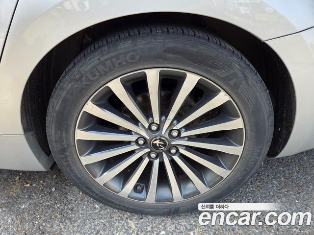 Kia K7 2012 — photo 10