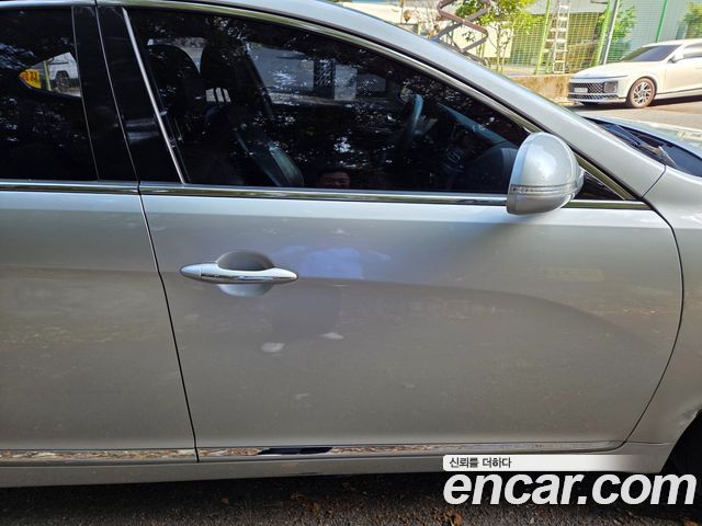 Kia K7 2012 — photo 18