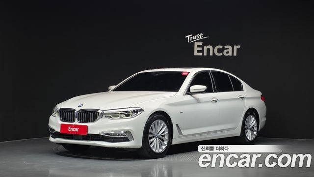 BMW 5-Series 2018 — photo 1
