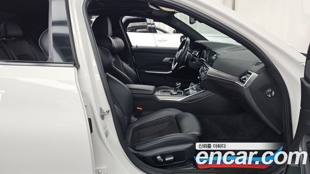 BMW 3-Series 2021 — photo 11