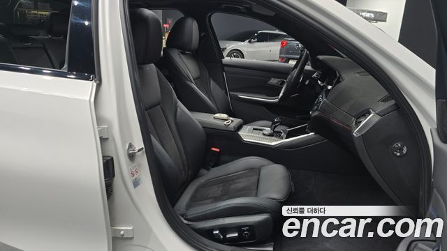 BMW 3-Series 2021 — photo 16